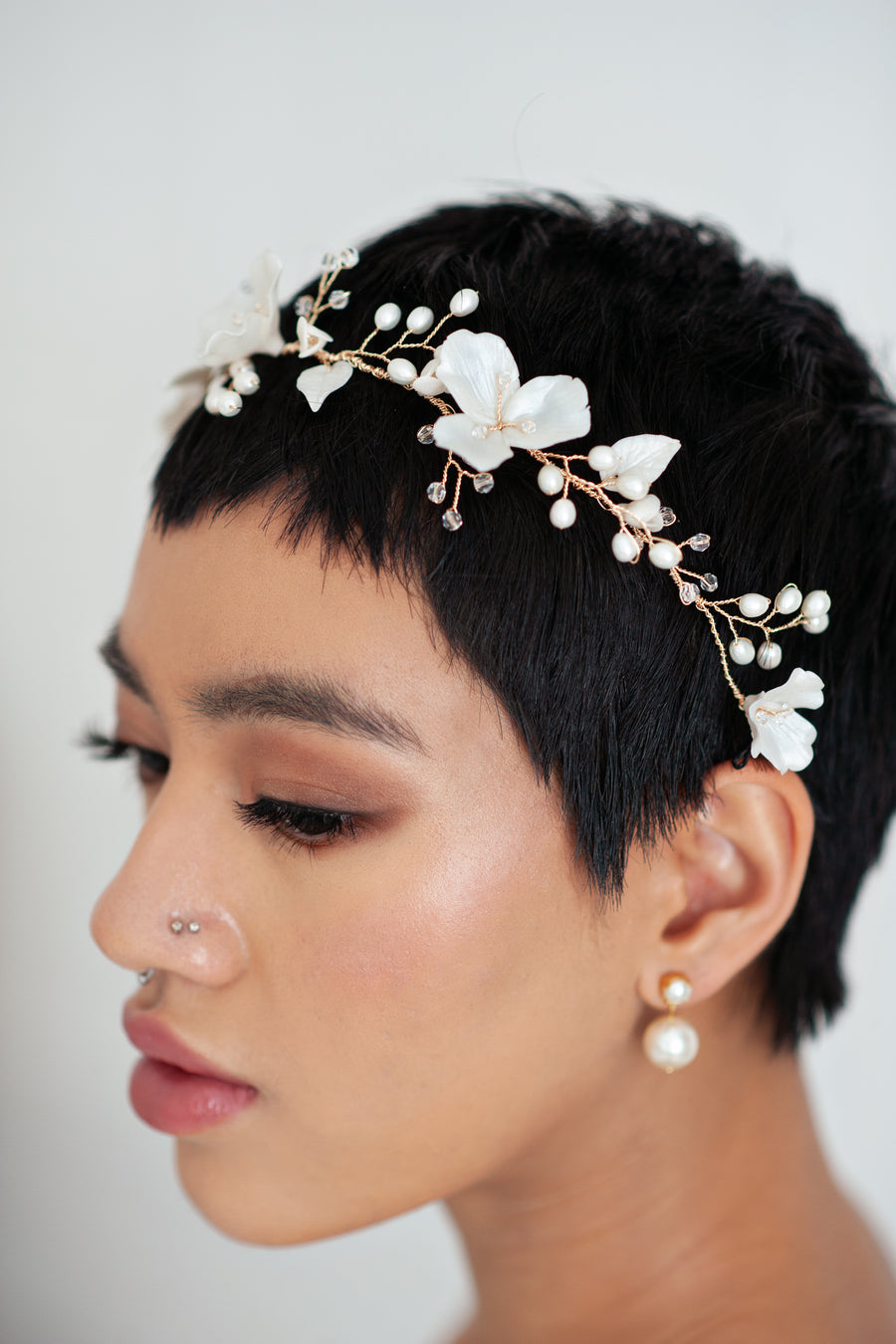 Bride wearing Pearl Earrings with Bridal hairvine by Joanna Bisley Designs