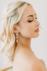 Bride wearing Swarovski Crystal Earrings by Joanna Bisley Designs