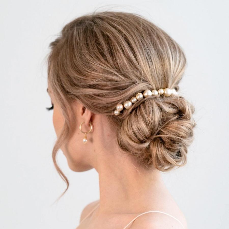 Pearl bridal comb by Joanna Bisley Designs.
