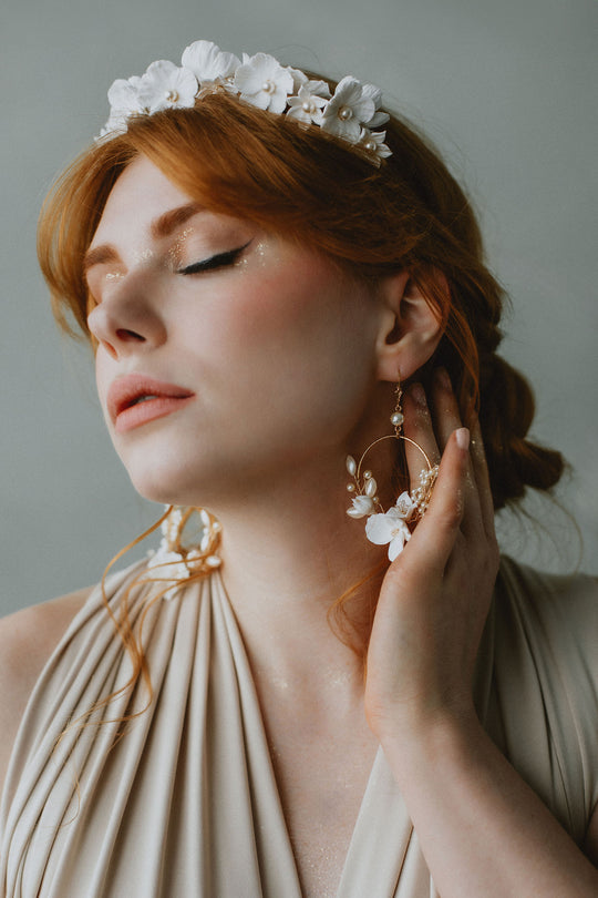 Bride wearing exquisite flower crown handmade by Canadian Designer Joanna Bisley Designs.