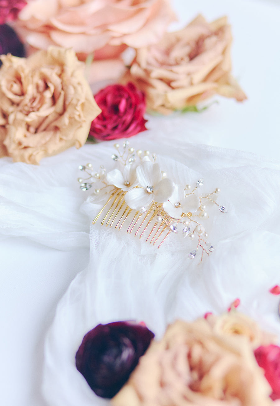 Bridal comb handcrafted with flowers and crystals handcrafted by Canadian Designer Joanna Bisley Designs.