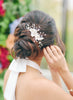 Elegant Dallas bride with updo wearing a crystal and flora wedding haircomb.