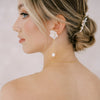 A Montreal Bride wearing our Amira flower and baroque pearl bridal earrings.