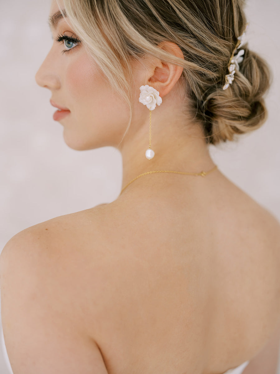 Bride wearing modern bridal earrings by Joanna Bisley Designs.
