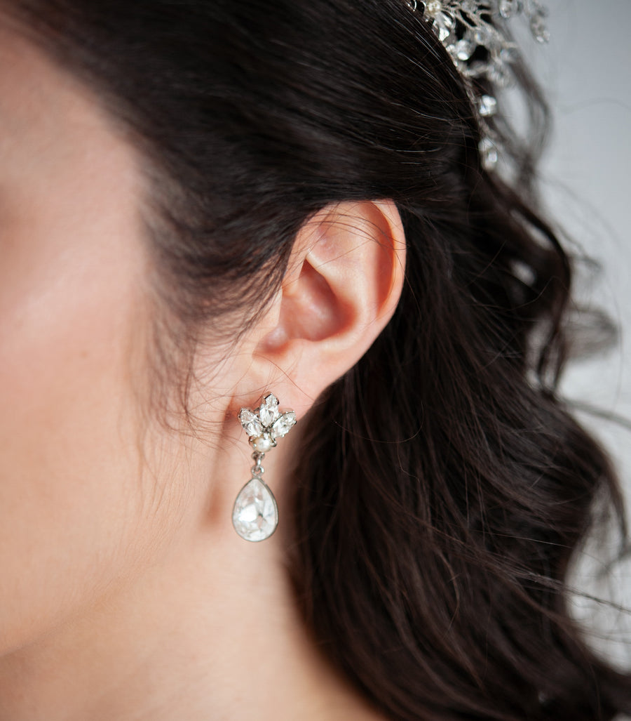 Bride wearing Swarovski Crystal Drop Bridal  Earrings handmade by Joanna Bisley Designs.