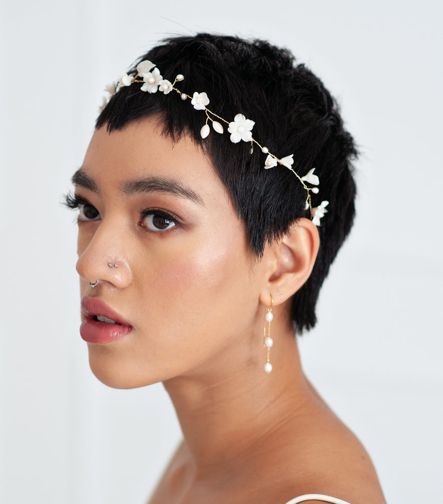 Bride wearing delivate floral hairvine by Joanna Bisley Designs