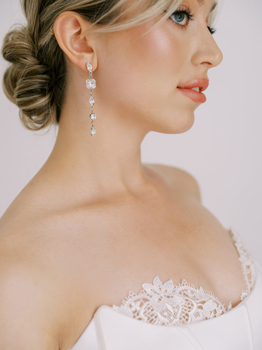 Vancouver Bride wearing long vintage crystal bridal earrings by Joanna Bisley Designs.