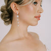 New York ride wearing long vintage Swarovski Crystal Bridal Earrings.
