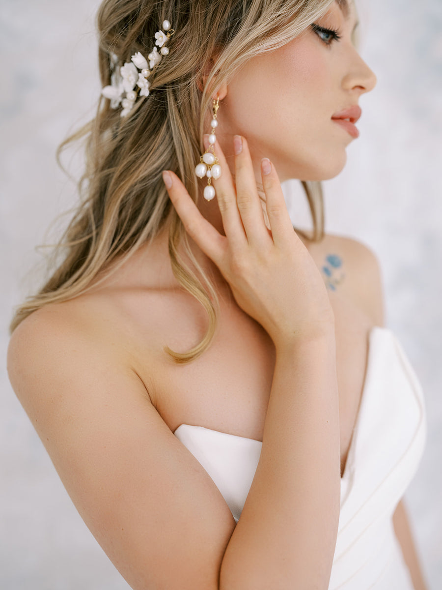 Ottawa bride wearing Pearl Bridal Chandelier Earrings and pearl bridal comb by Joanna Bisley Designs