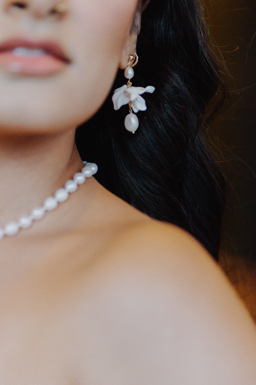 Los Angeles bride wearing pearl bridal necklace and earrings by Joanna Bisley Designs.