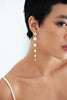 Toronto bride wearing long pearl bridal earrings with a Swarovski Crystal stud.