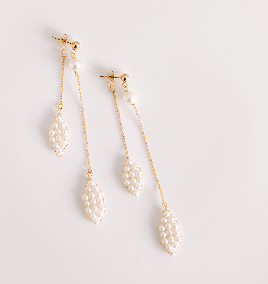 Product photo of pair of elegant pearl bridal earrings.