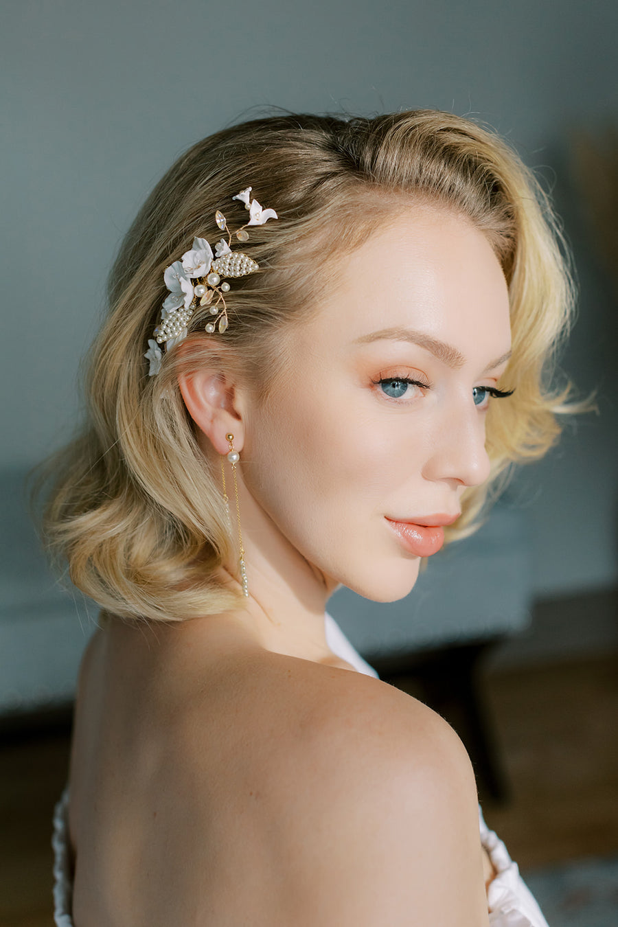 Bride wearing elegant bridal comb by Joanna Bisley Designs