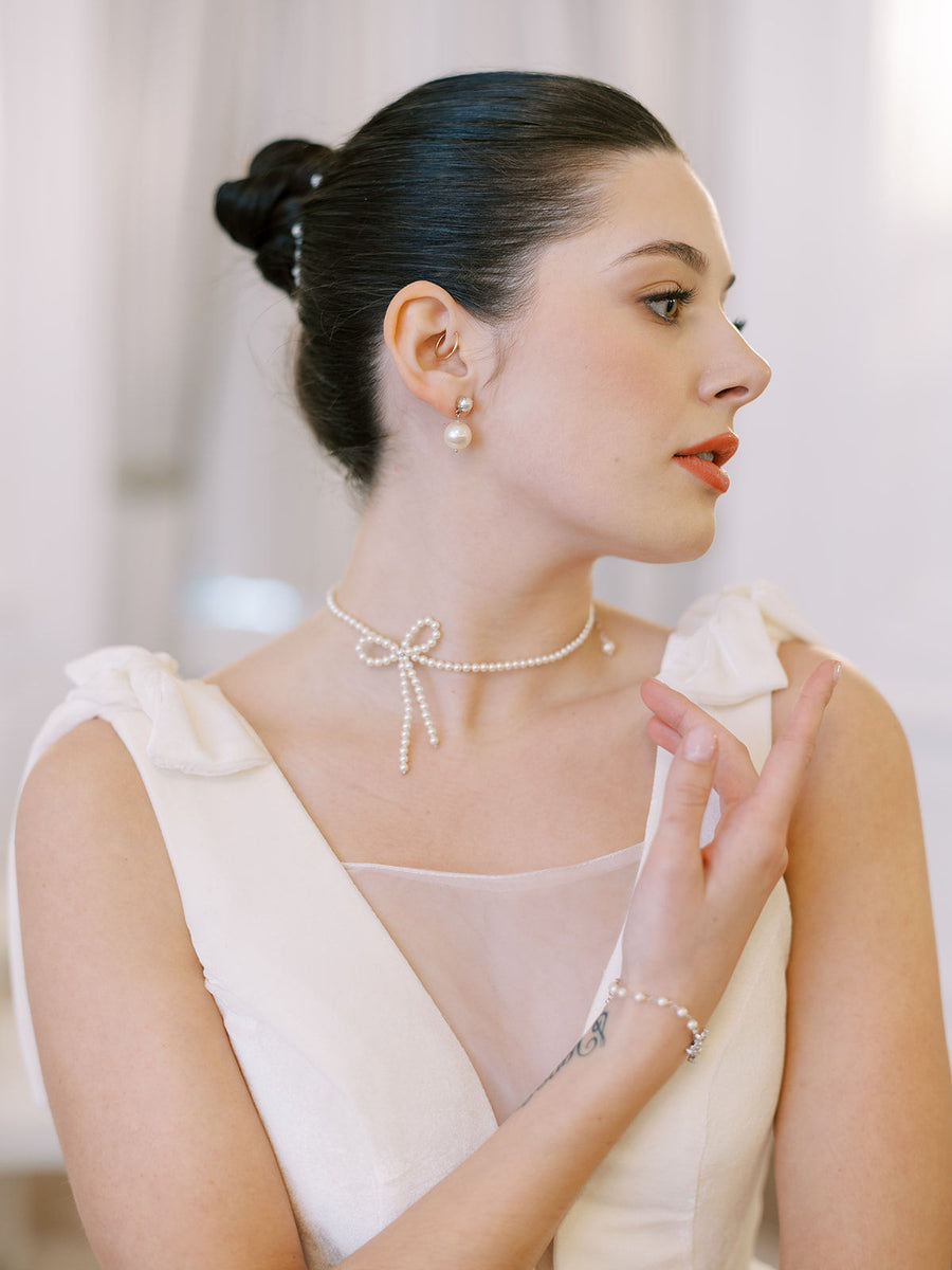 Toronto bride wearing a pearl bow necklace by Joanna Bisley Designs.