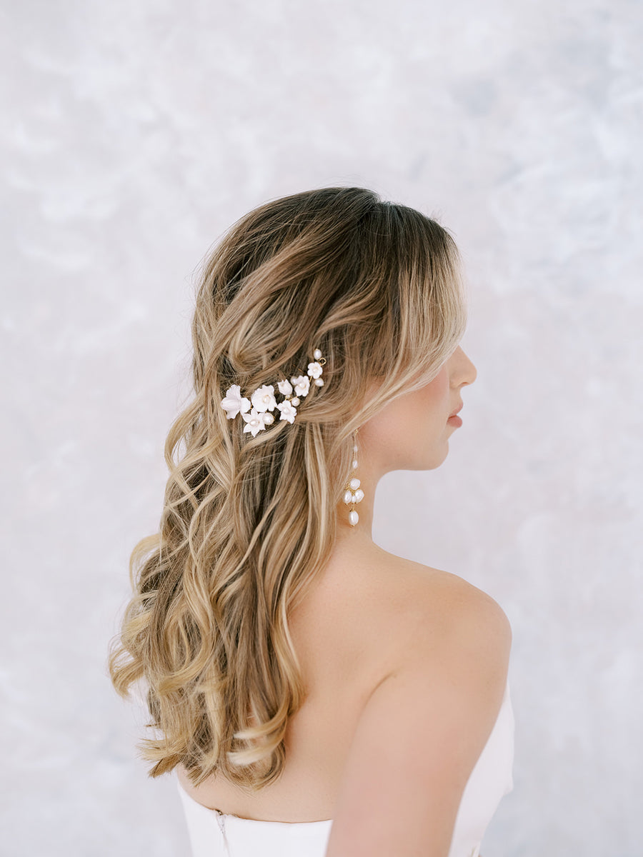 Montreal bride wearing pearl Chandelier Earrings with Flower Bridal Hairpiece.