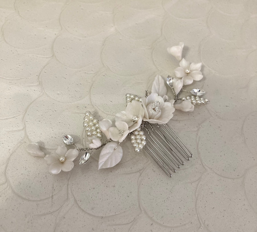 A vintage inspired bridal comb with flowers and Swarovski Crystals by Joanna Bisley Designs.