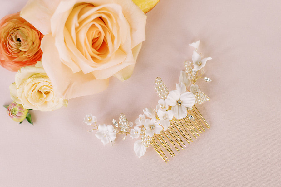 Romantic pearl and flower bridal comb by Joanna Bisley Designs.