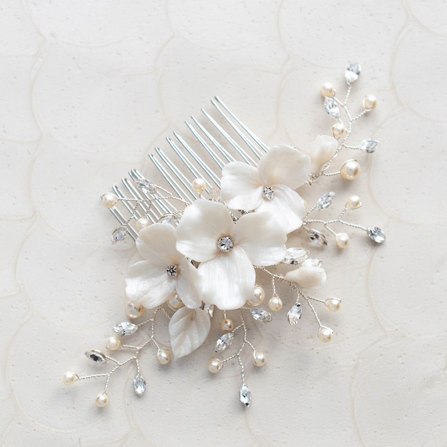Modern silver bridal haircomb handcrafted with clay florals, Swarovski Crystal and Pearls by Joanna Bisley Designs.