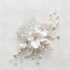 Modern bridal haircomb handcrafted with clay florals, Swarovski Crystal and Pearls by Joanna Bisley Designs.