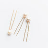 Simple Pearl wedding pins perfect for  most bridal hairstyles. Shown in gold. 