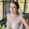 Bride wearing clear crystal and silver wedding earrings by Canadian Wedding Jewelry Designer Joanna Bisley Designs 