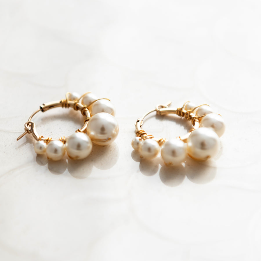 Chic Pearl Bridal Hoop Earrings ideal for the modern bride. These earrings were handcrafted in Canadian Wedding Accessory Designer Joanna Bisley’s studio. 