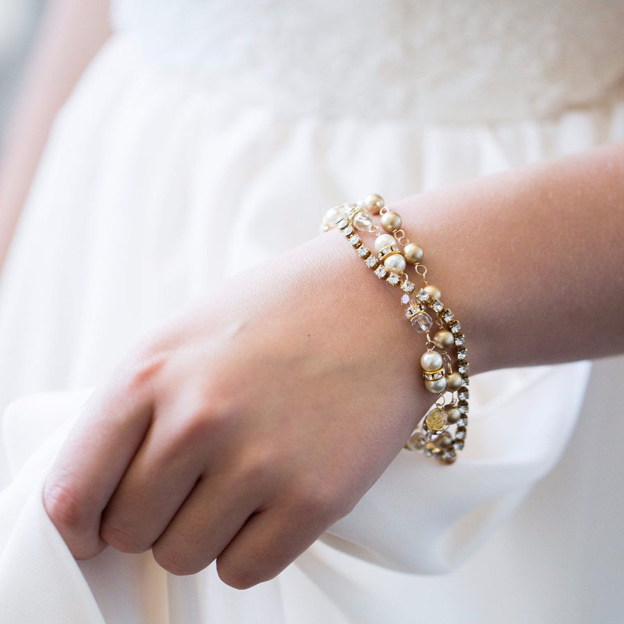 Swarovski Crystal and pearl gold triple strand bridal bracelet