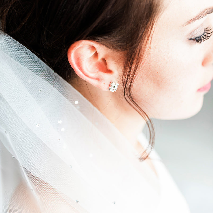 Bride wearing a unique stud wedding earrings by Joanna Bisley Designs.