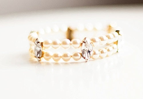 A luxury pearl and crystal cuff bracelet by Joanna Bisley Designs.