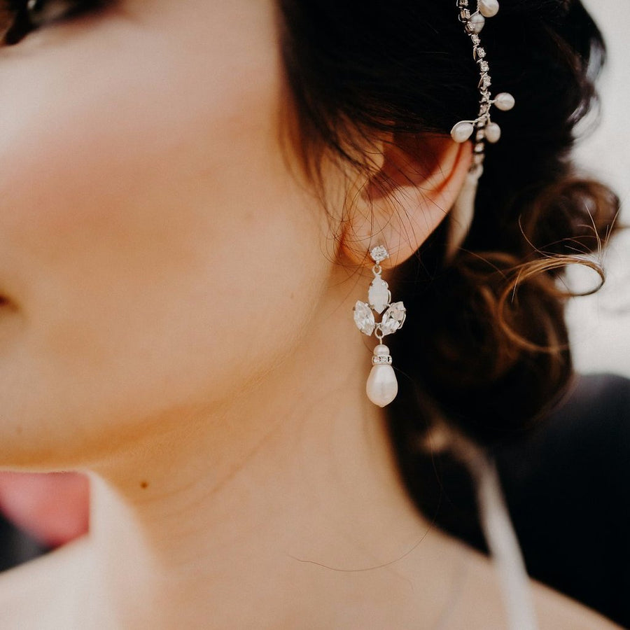 A delicate pearl drop bridal earring with opal and clear Swarovski Crystal by Joanna Bisley Designs.