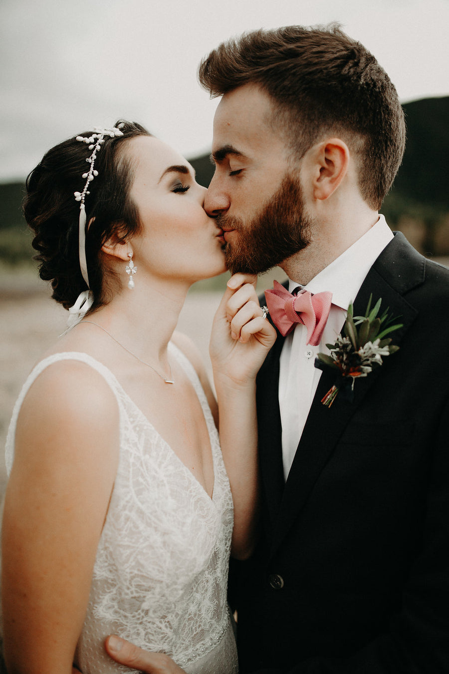 Bride wearing vintage inspired bridal  earrings by Joanna Bisley Designs.