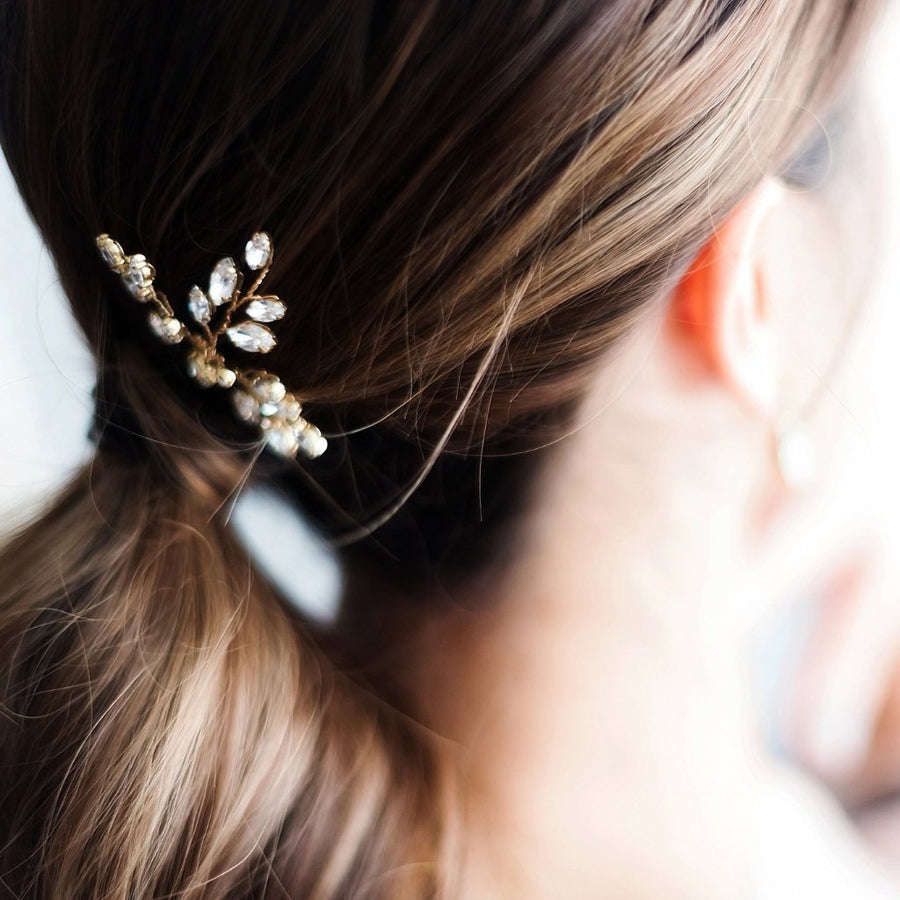 Swarovski Crystal gold bridal pins worn by bride with wedding ponytail 